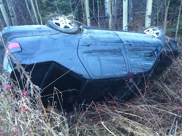 Rollover on Highway 97 slows traffic