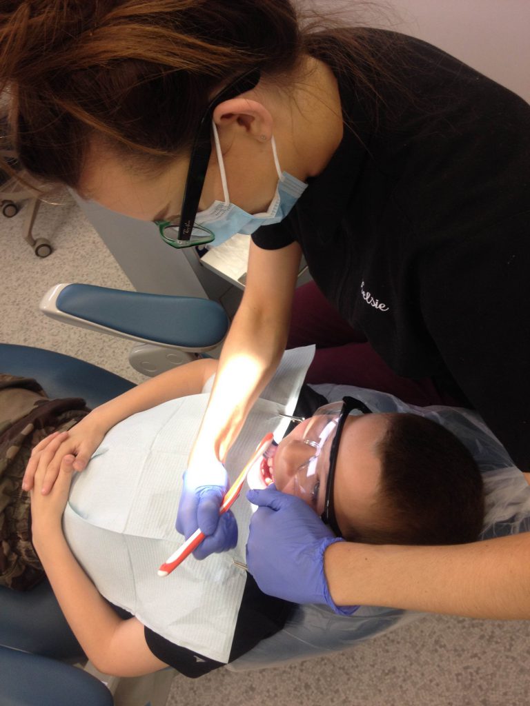 CNC Dentistry Students “Sealing in” Young Smiles