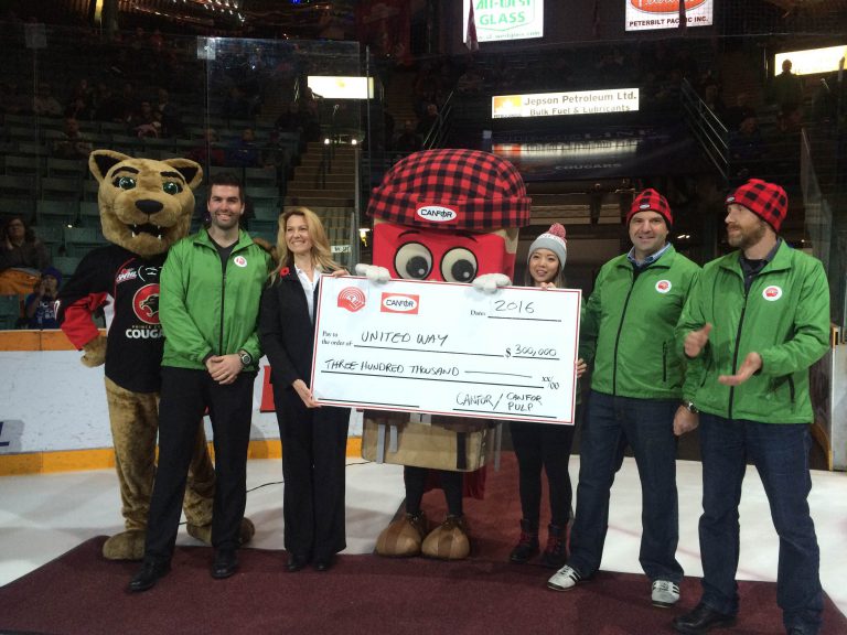 Canfor donates $300K to United Way at Cougars game