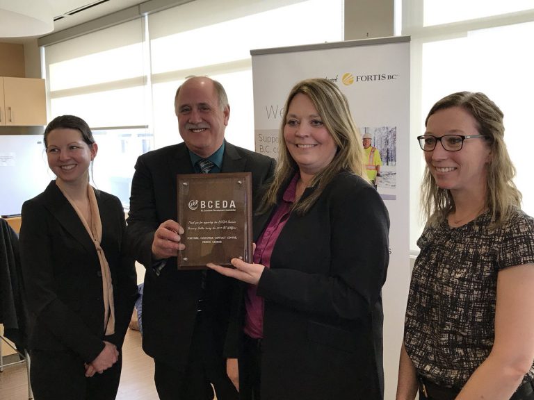 A plaque was given to FortisBC for their support during wildfires