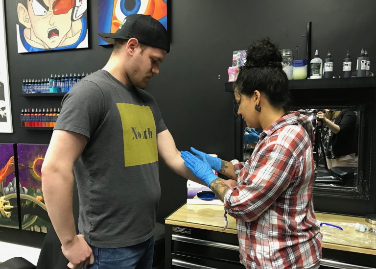 WATCH: People get tattooed to raise awareness for mental health