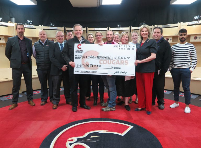 Cougars make yet another sizable donation to United Way