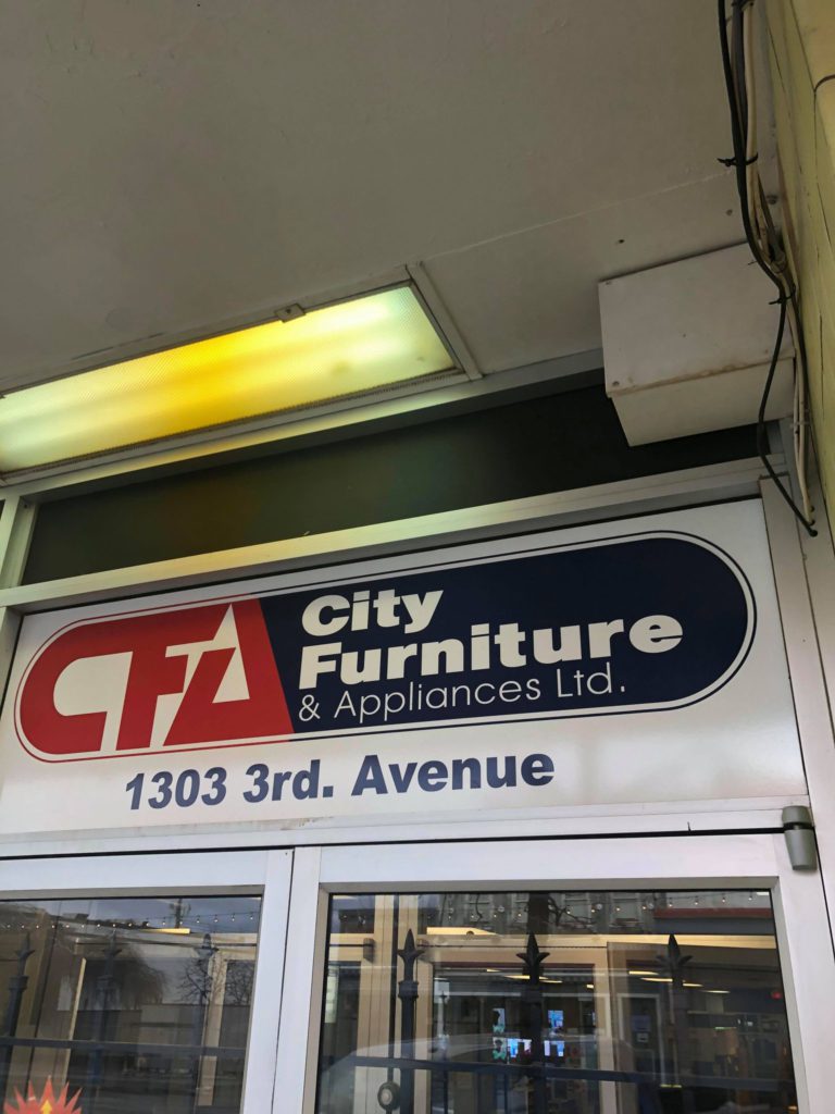 Three people charged after break in at City Furniture